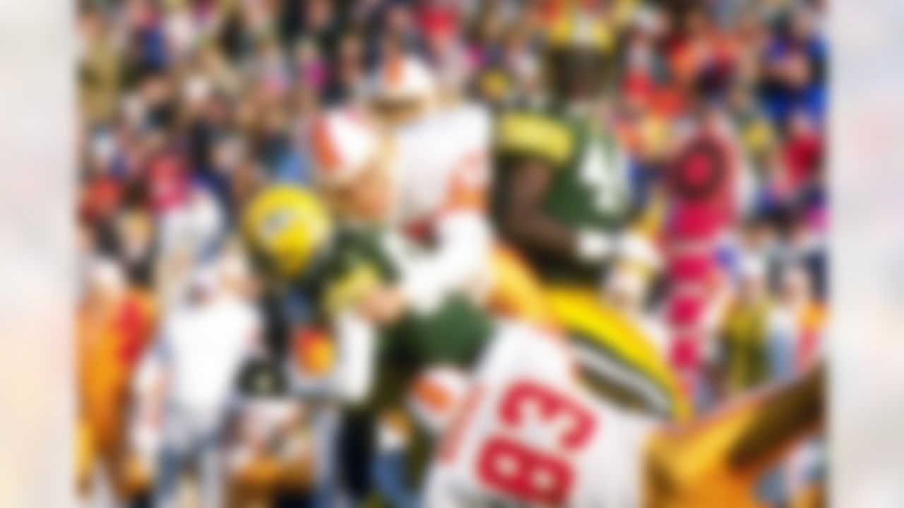 28 Nov 1993: Defensive back John Lynch of the Tampa Bay Buccaneers makes a tackle during a game against the Green Bay Packers. The Packers won the game, 16-13. (Photo by Todd Rosenberg/Getty Images)