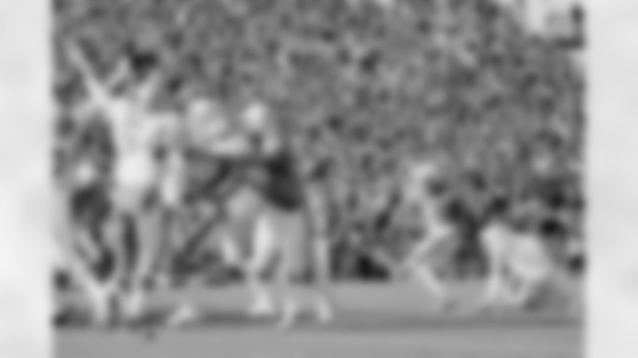Miami field goal kicker Garo Yepremian follows through as the ball heads for the goal posts and three points in the first half of Super Bowl VI, Sunday, Jan. 16, 1972 in New Orleans. It was a 31-yard field goal. Holding is Karl Noonan. (Associated Press)
