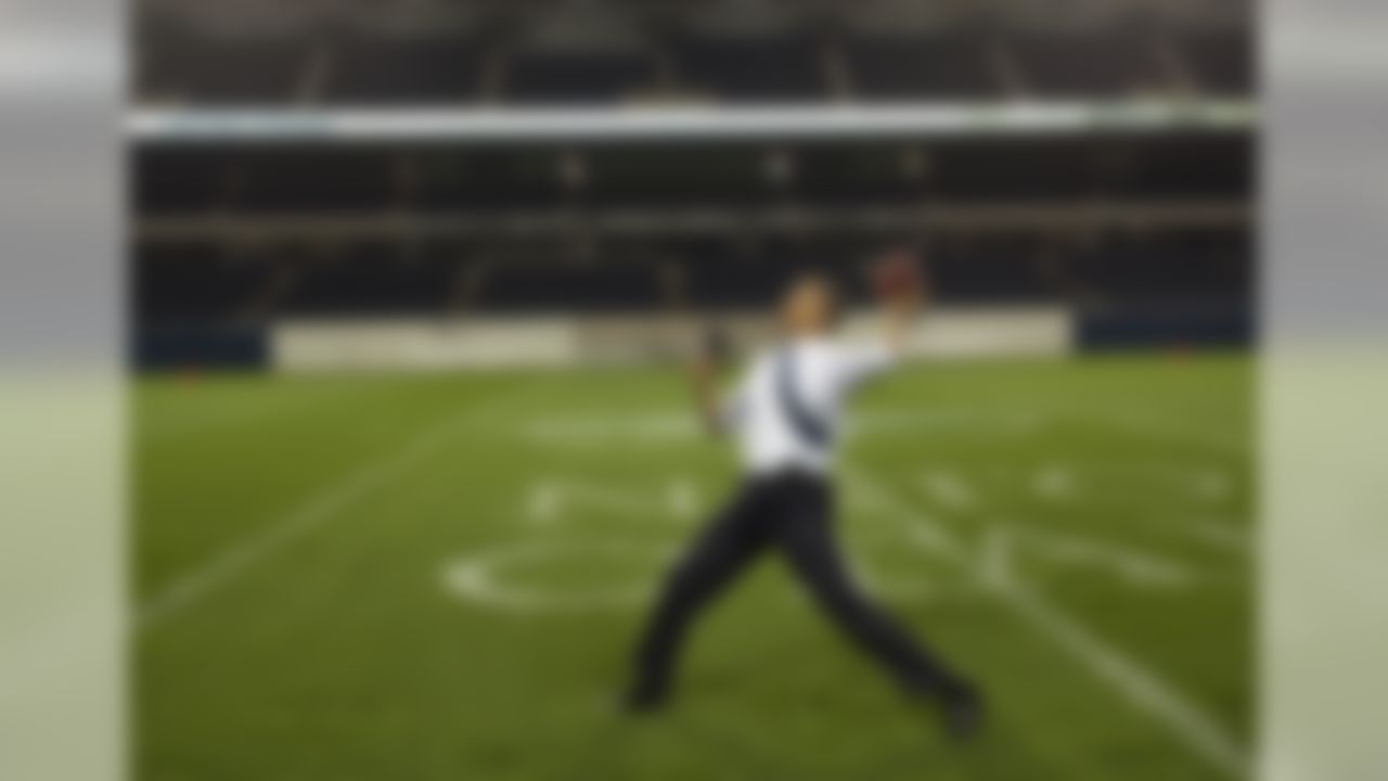 President Barack Obama throws a football on the field at Soldier Field following the NATO working dinner in Chicago, Illinois, May 20, 2012.  (Official White House Photo by Pete Souza)