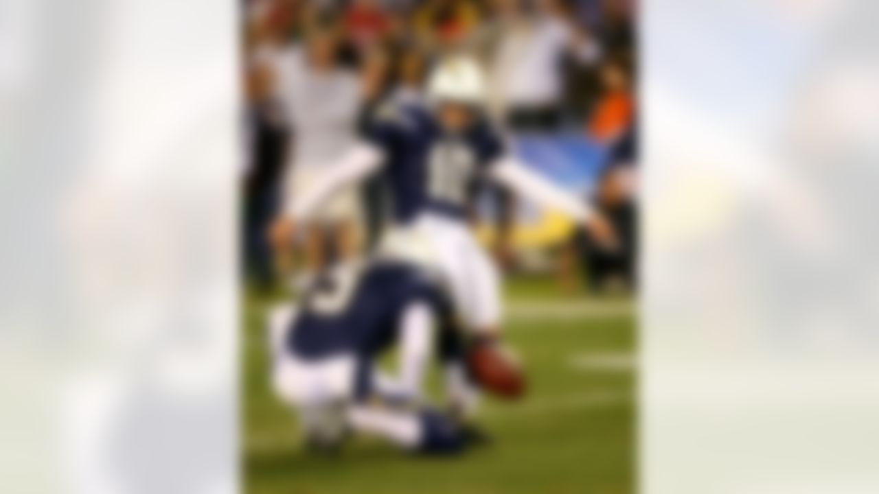 SAN DIEGO - DECEMBER 24: Place kicker Nate Kaeding #10 of the San Diego Chargers kicks a field goal at the end of the first half to give the Chargers a 16-0 lead during the game against the Denver Broncos at Qualcomm Stadium on December 24, 2007 in San Diego, California. (Photo by Paul Spinelli/Getty Images)