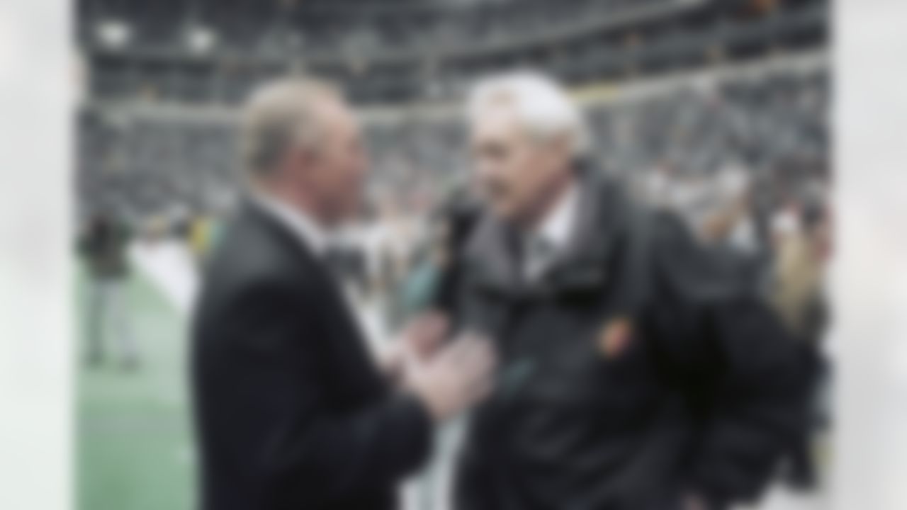 Dallas Cowboys owner Jerry Jones, left, talks with CBS commentator Pat Summerall before the start of the Cowboys NFC championship game against the San Francisco 49ers, Jan. 23, 1994 in Irving, Texas. (AP Photo/Ron Heflin)