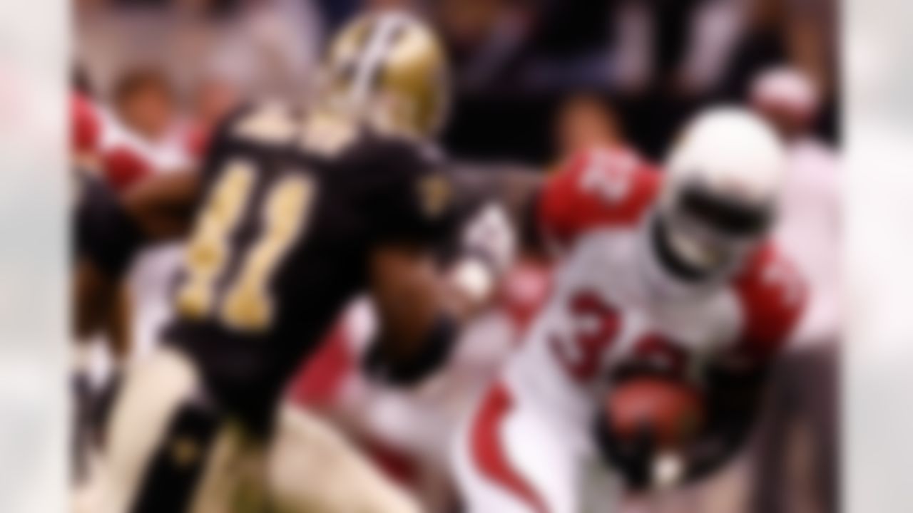 NEW ORLEANS - DECEMBER 16: Edgerrin James #32 of the Arizona Cardinals tries to avoid a tackle by Roman Harper #41 of the New Orleans Saints on December 16, 2007 at the Louisiana Superdome in New Orleans, Louisiana. The Saints defeated the Cardinals 31-24. (Photo by Chris Graythen/Getty Images)