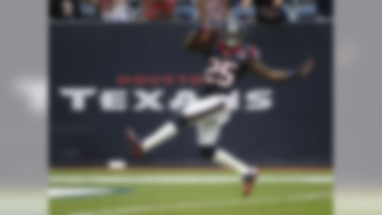 Houston Texans cornerback Kareem Jackson dances into the end zone for a touchdown after an interception against the Tennessee Titans. (AP Photo/Dave Einsel)