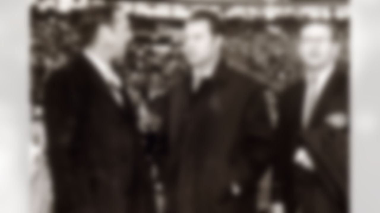 NFL Commissioner Pete Rozelle meets with Frank Gifford and Kansas City Chiefs owner Lamar Hunt before the Miami Dolphins defeated the Chiefs 27-24 in overtime in the 1971 AFC Divisional Playoff Game at Kansas City's Municipal Stadium on December 25, 1971 in Kansas City, Missouri. (National Football League)