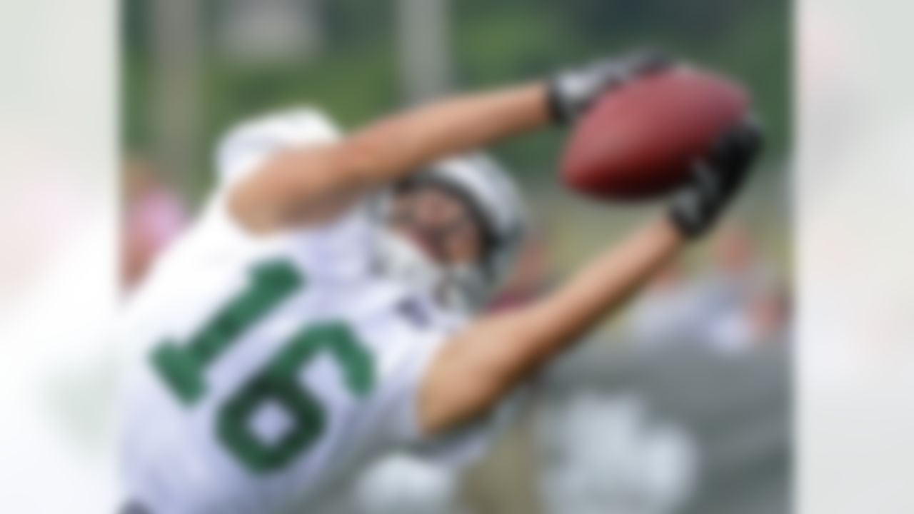 New York Jets wide receiver Scotty McKnight catches a pass at NFL football training camp on Sunday, July 29, 2012, in Cortland, N.Y. (AP Photo/Bill Kostroun)