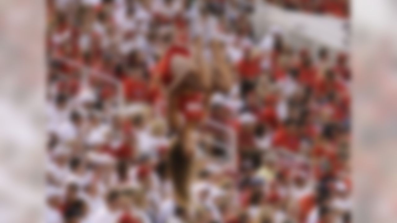 A Utah cheerleader is flipped in to the air in the first half during an NCAA college football game against Southern Utah Thursday, Sept. 1, 2016, in Salt Lake City. (AP Photo/Rick Bowmer)