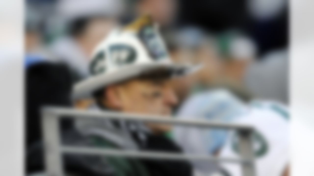 New York Jets fan, Fireman Ed Anzalone, looks on during the fourth quarter of an NFL football game between the New York Giants and the Jets, Saturday, Dec. 24, 2011, in East Rutherford, N.J. The Giants defeated the Jets 29-14. (AP Photo/Bill Kostroun)