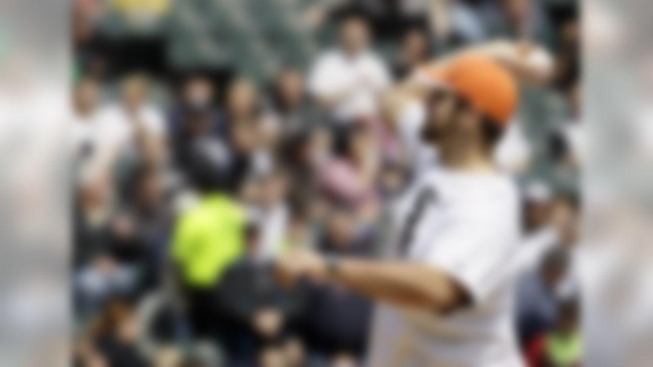 Chicago Bears offensive tackle Gabe Carimi throws out the first pitch before the Baltimore Orioles play the Chicago White Sox in Chicago in May 2011. (AP Photo/Nam Y. Huh)