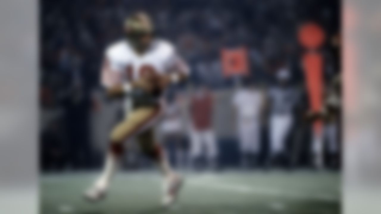San Francisco 49ers Hall of Fame quarterback Joe Montana (16) rolls out during Super Bowl XVI, a 26-21 victory over the Cincinnati Bengals on January 24, 1982, at the Pontiac Silverdome in Pontiac, Michigan. (Al Messerschmidt/NFL)