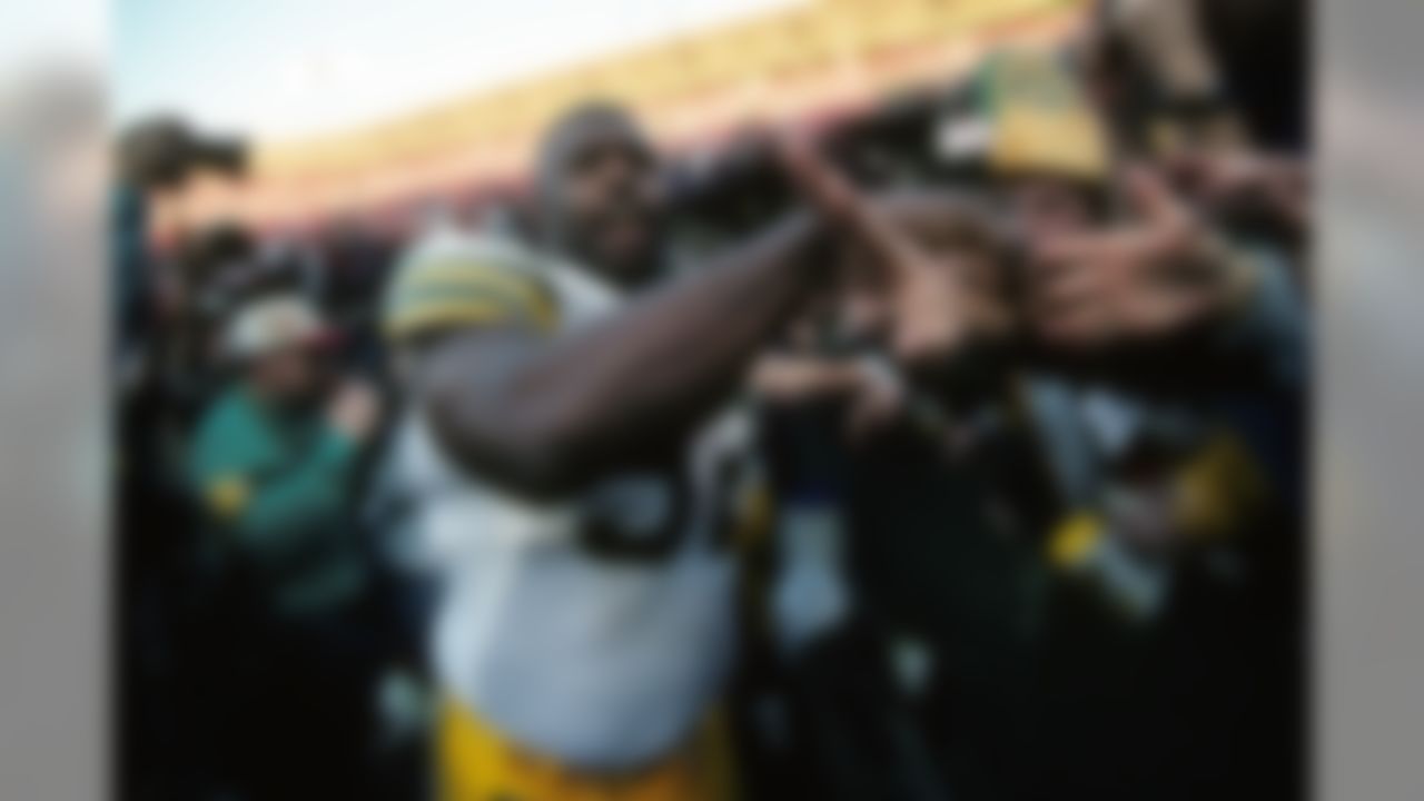 Green Bay Packers defensive lineman Reggie White (92) celebrates during an NFL game against the San Francisco 49ers, Sunday, Jan. 6, 1996 in San Francisco. The Packers won the game, 27 to 17. (AP Photo/Greg Trott)