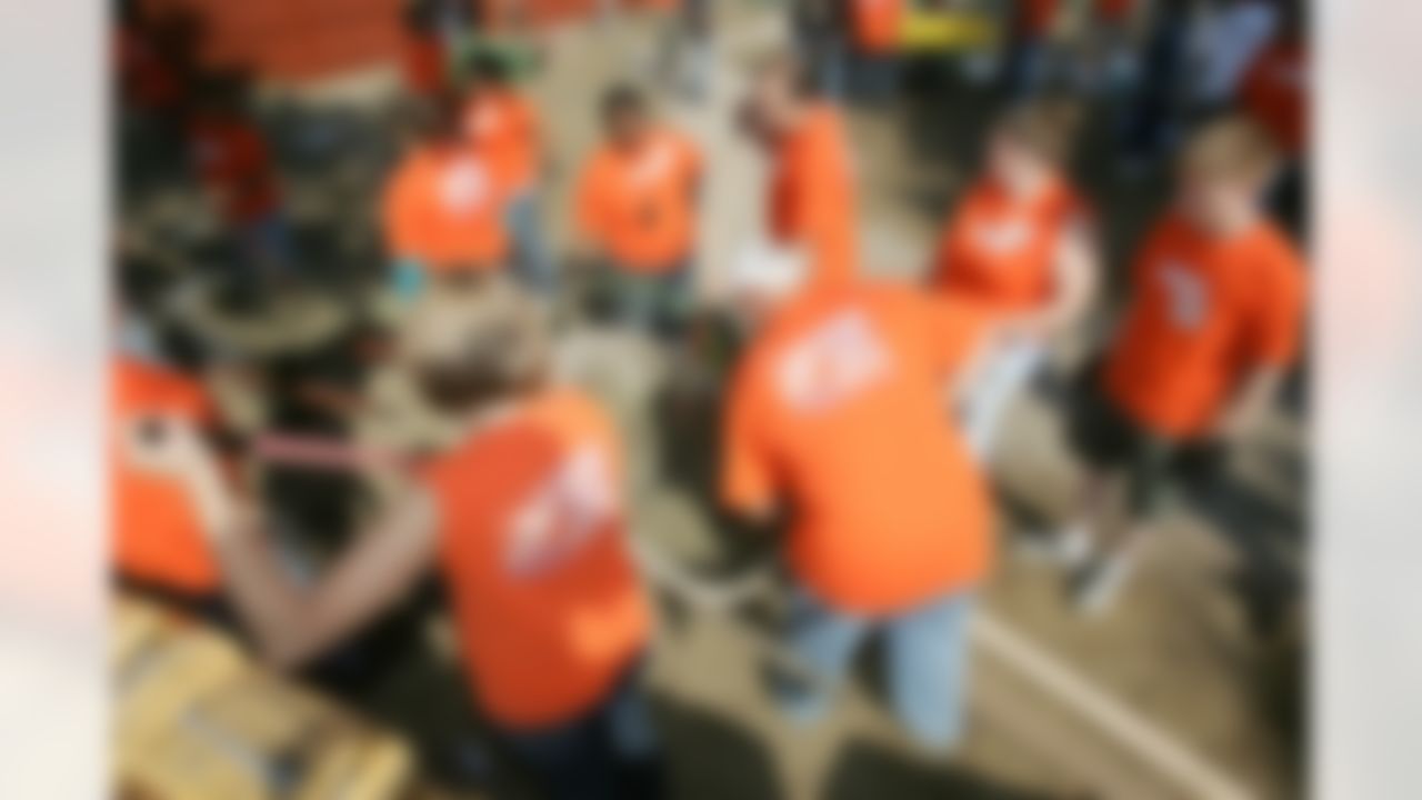 The Home Depot associates digging in deep to make a difference in Cleveland. (Photo by Alan Marler/CIA Stock Photography, Inc.)