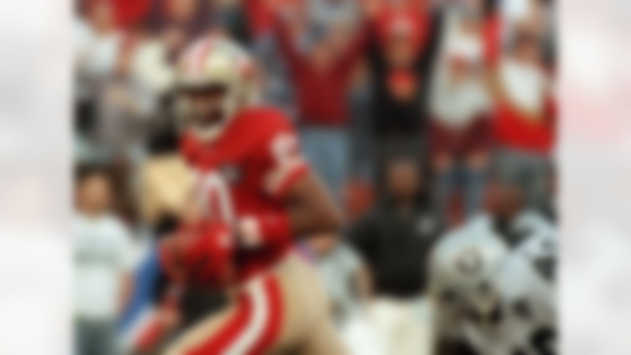 In the season-opening "Monday Night Football" game, Jerry Rice scored three touchdowns to pass Jim Brown on the all-time touchdown list with his 127th such score. The 49ers rolled to a 44-14 win over the visiting Los Angeles Raiders.