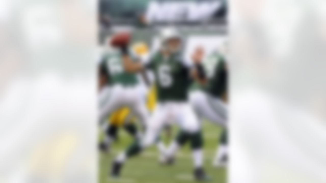 New York Jets quarterback Mark Sanchez looks to pass during the third quarter of an NFL football game between the Green Bay Packers and the New York Jets at New Meadowlands Stadium Sunday, Oct. 31, 2010, in East Rutherford, N.J. (AP Photo/Bill Kostroun)