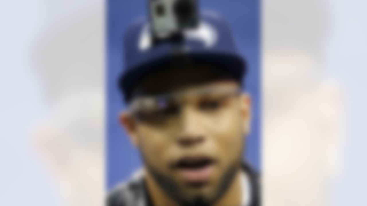 Seattle Seahawks' Golden Tate wears Google glasses during media day for the NFL Super Bowl XLVIII football game Tuesday, Jan. 28, 2014, in Newark, N.J. (AP Photo/Matt Slocum)