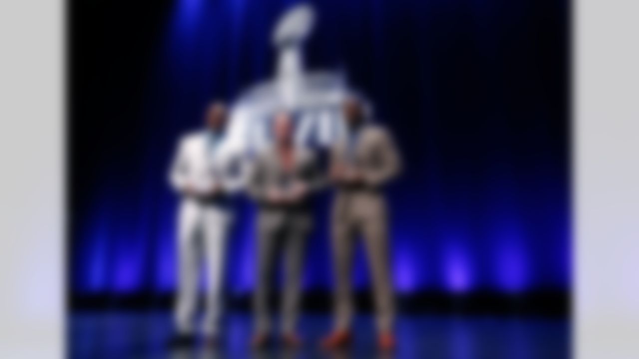 Carolina Panthers outside linebacker Thomas Davis, Arizona Cardinals kicker Jay Feely, and Chicago Bears cornerback Charles Tillman pose for photos during a press conference for the Walter Payton Man of the Year award at the Rose Theater on Friday, January 31, 2014 in New York, NY. (Perry Knotts/NFL)