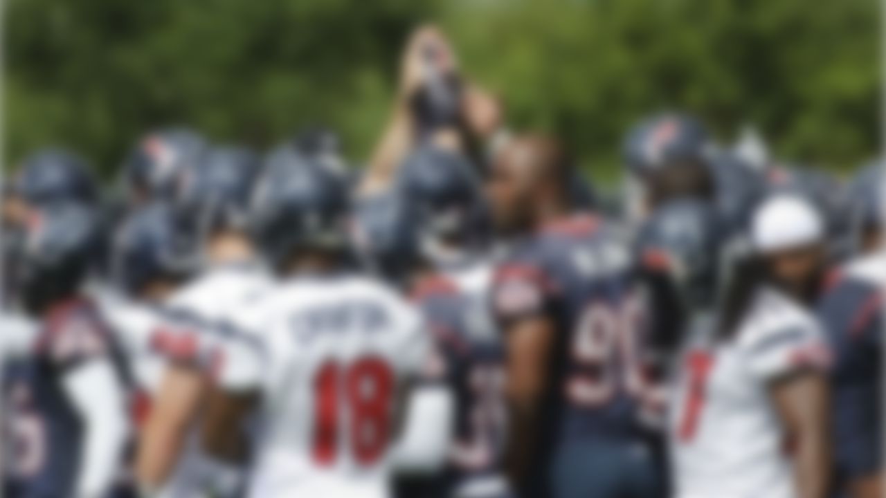 The Houston Texans huddle before the start of practice during an NFL football mini camp, Thursday, May 20, 2010, in Houston. (AP Photo/Dave Einsel)