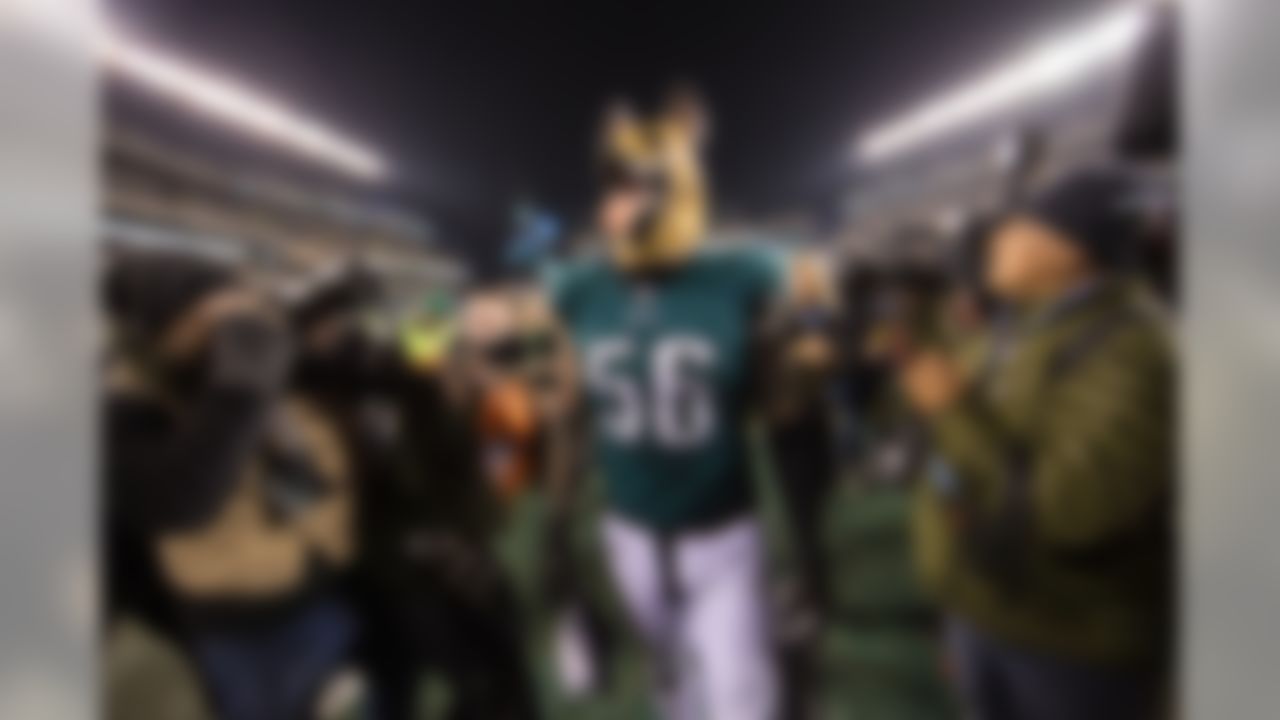 Philadelphia Eagles defensive end Chris Long (56) leaves the field wearing a dog mask in reaction to the Eagles being home under-dogs for their past two playoff games despite being the first seed after the NFC Championship Game against the Minnesota Vikings, Sunday, Jan. 21, 2018, in Philadelphia. The Eagles defeated the Vikings, 38-7.