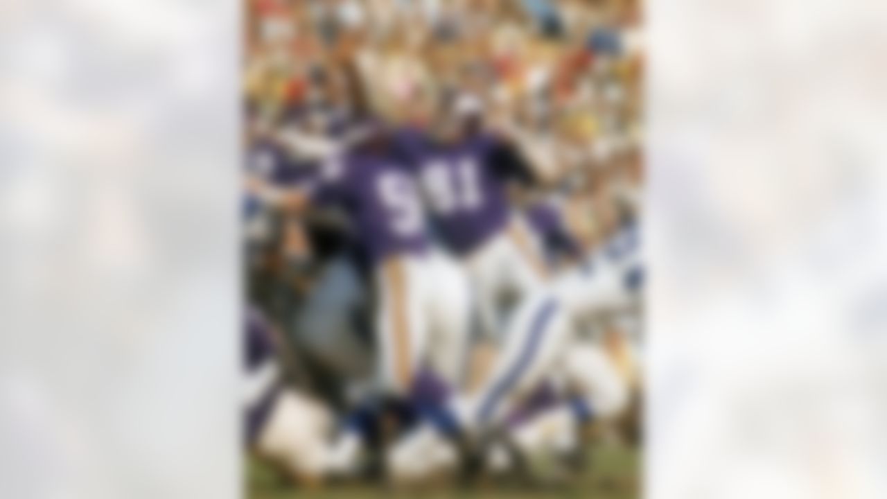 Defensive end Carl Eller #81 of the Minnesota Vikings linebacker Wally Hilgenberg #58 pass rush against the Los Angeles Rams in the 1969 NFL Western Conference Playoff Game at the Los Angeles Memorial Coliseum on December 27, 1969 in Los Angeles, California. The Vikings defeated the Rams 23-20. (National Football League)