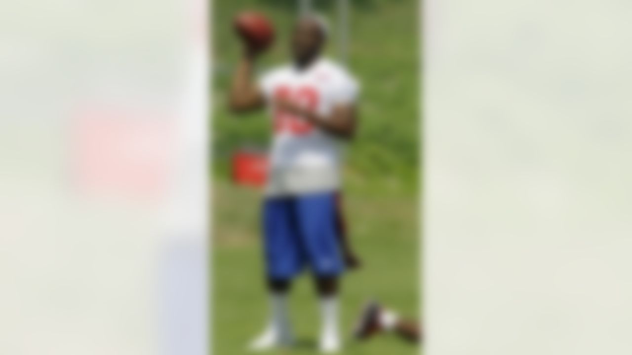 New York Giants wide receiver Hakeem Nicks (88), who is on the physically unable to perform list as he recovers a broken right foot, watches a workout at NFL football training camp in Albany, N.Y., Sunday, July 29, 2012. (AP Photo/Kathy Willens)