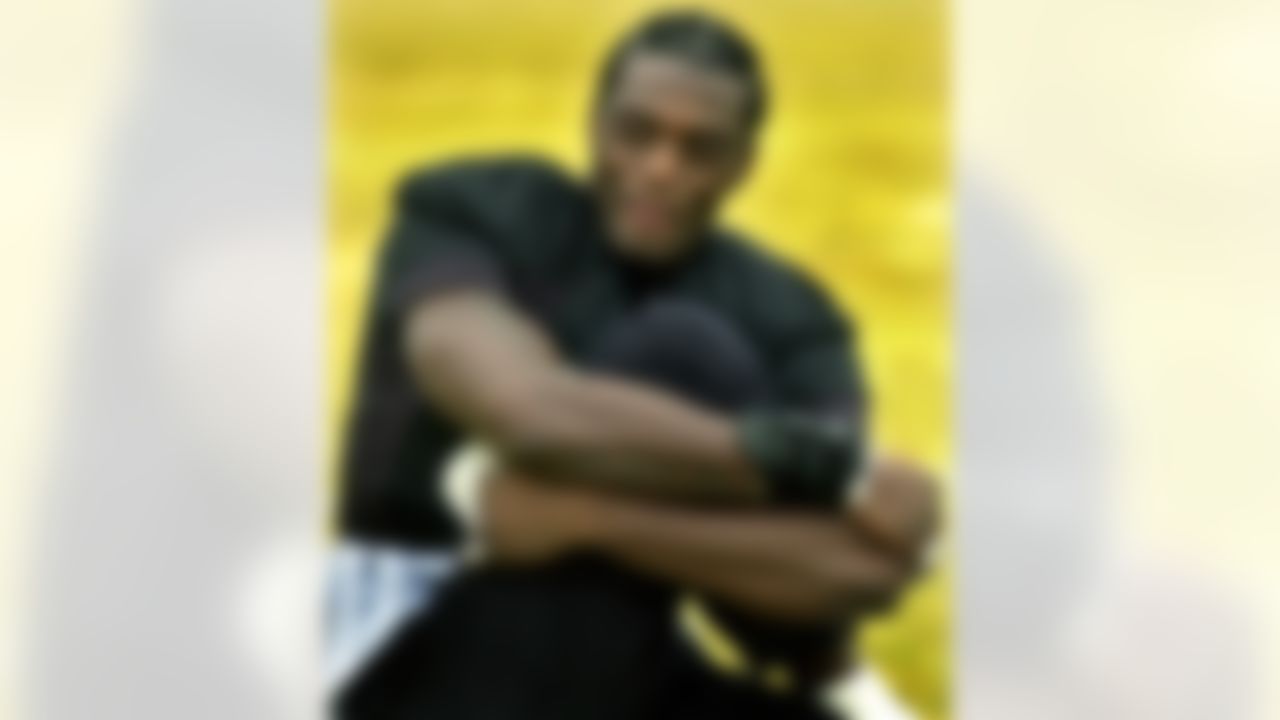 Pittsburgh Steelers wide receiver Plaxico Burress stretches before a team workout Wednesday, Jan. 23, 2002, in Pittsburgh. The Steelers are preparing to meet the New England Patriots in the AFC Championship game Sunday in Pittsburgh.(AP Photo/Gene J. Puskar)