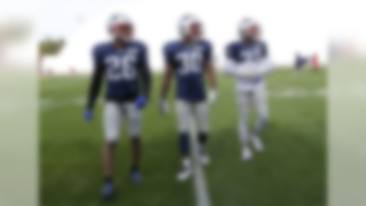 New England Patriots cornerback Logan Ryan (26), safety Duron Harmon (30) and safety Devin McCourty (32) walk to the sideline during practice Wednesday, Jan. 28, 2015, in Tempe, Ariz. The Patriots play the Seattle Seahawks in NFL football Super Bowl XLIX Sunday, Feb. 1, in Glendale, Ariz. (AP Photo/Mark Humphrey)