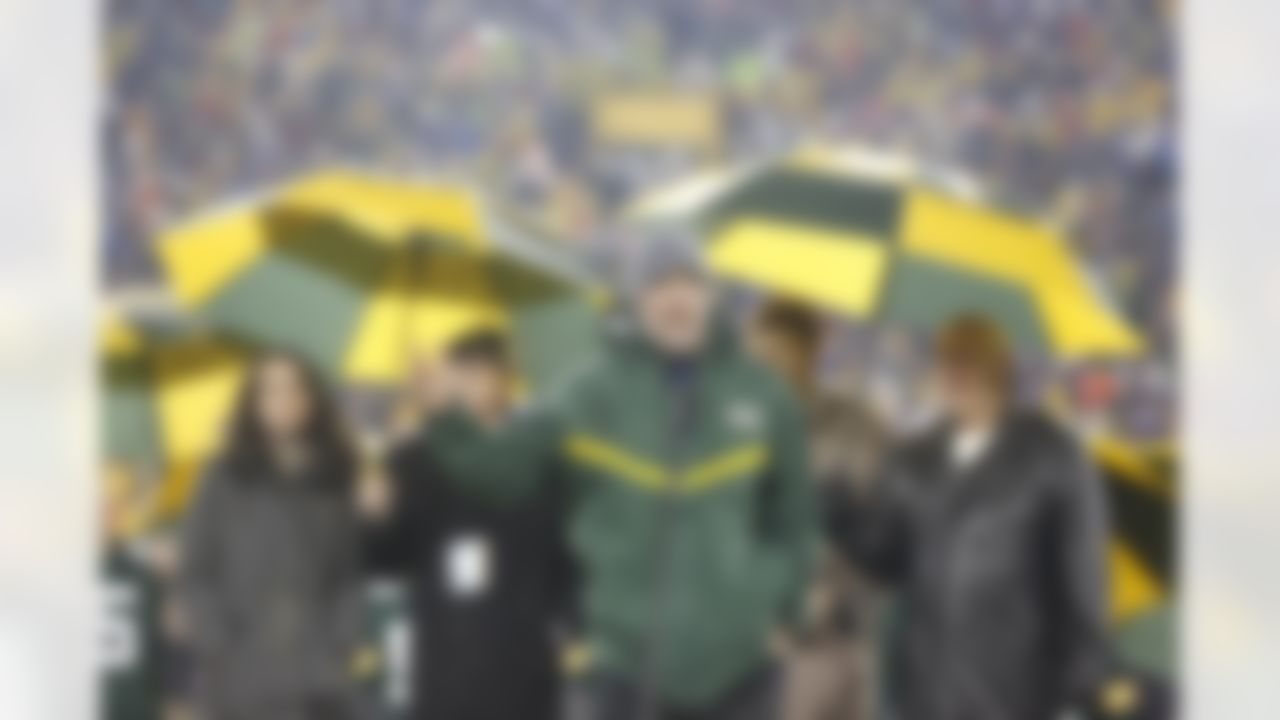Brett Favre during a ceremony at halftime of an NFL football game between the Green Bay Packers and Chicago Bears Thursday, Nov. 26, 2015, in Green Bay, Wis. Favre's retired No. 4 and name were unveiled inside Lambeau Field during the ceremony. (AP Photo/Mike Roemer)