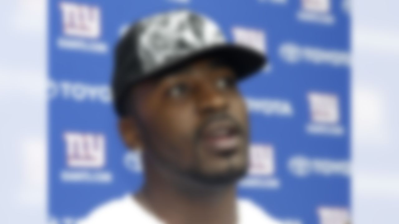 New York Giants wide receiver Hakeem Nicks, who is active on the roster but recovering from a foot injury suffered during organized team activity earlier in the summer, speaks to the media at NFL football training camp in Albany, N.Y., Sunday, July 29, 2012. (AP Photo/Kathy Willens)