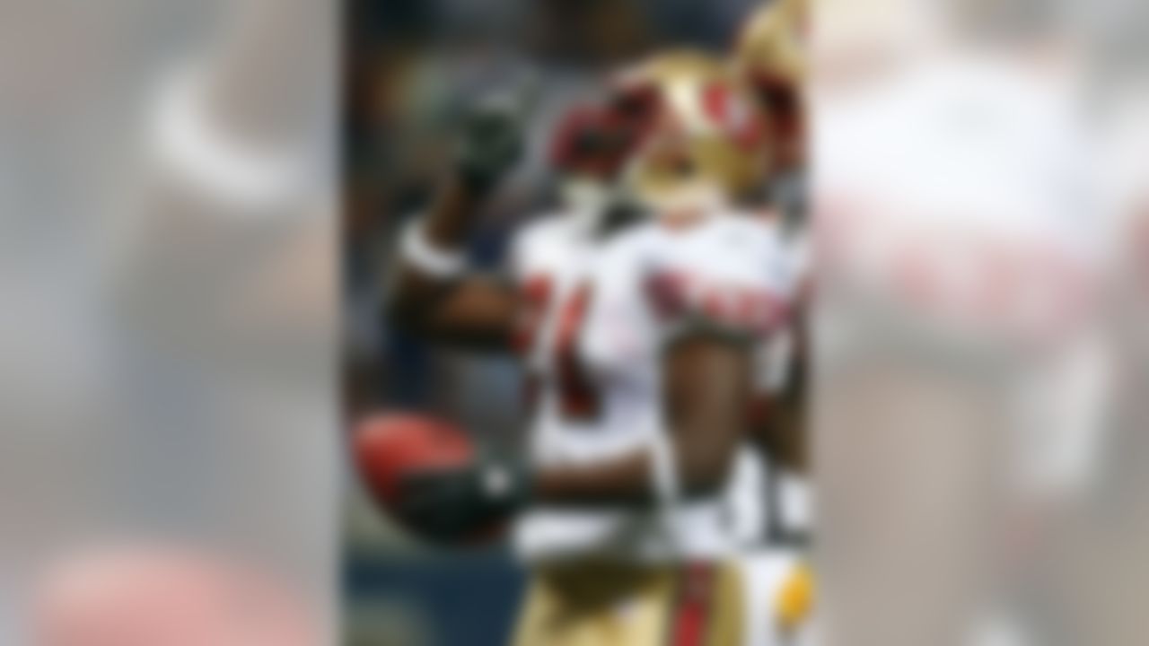 ST. LOUIS - SEPTEMBER 16: Frank Gore #21 of the San Francisco 49ers celebrates his touchdown in the second quarter against the St. Louis Rams at the Edward Jones Dome September 16, 2007 in St. Louis, Missouri. (Photo by Elsa/Getty Images)