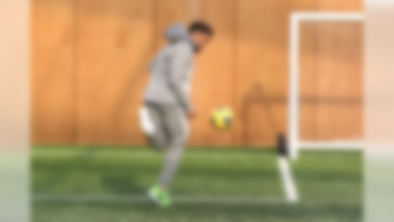 New York Giants wide receiver Odell Beckham Jr. plays with a soccer ball at Spurs Training Ground on February 27, 2015. (Dave Shopland/NFL)