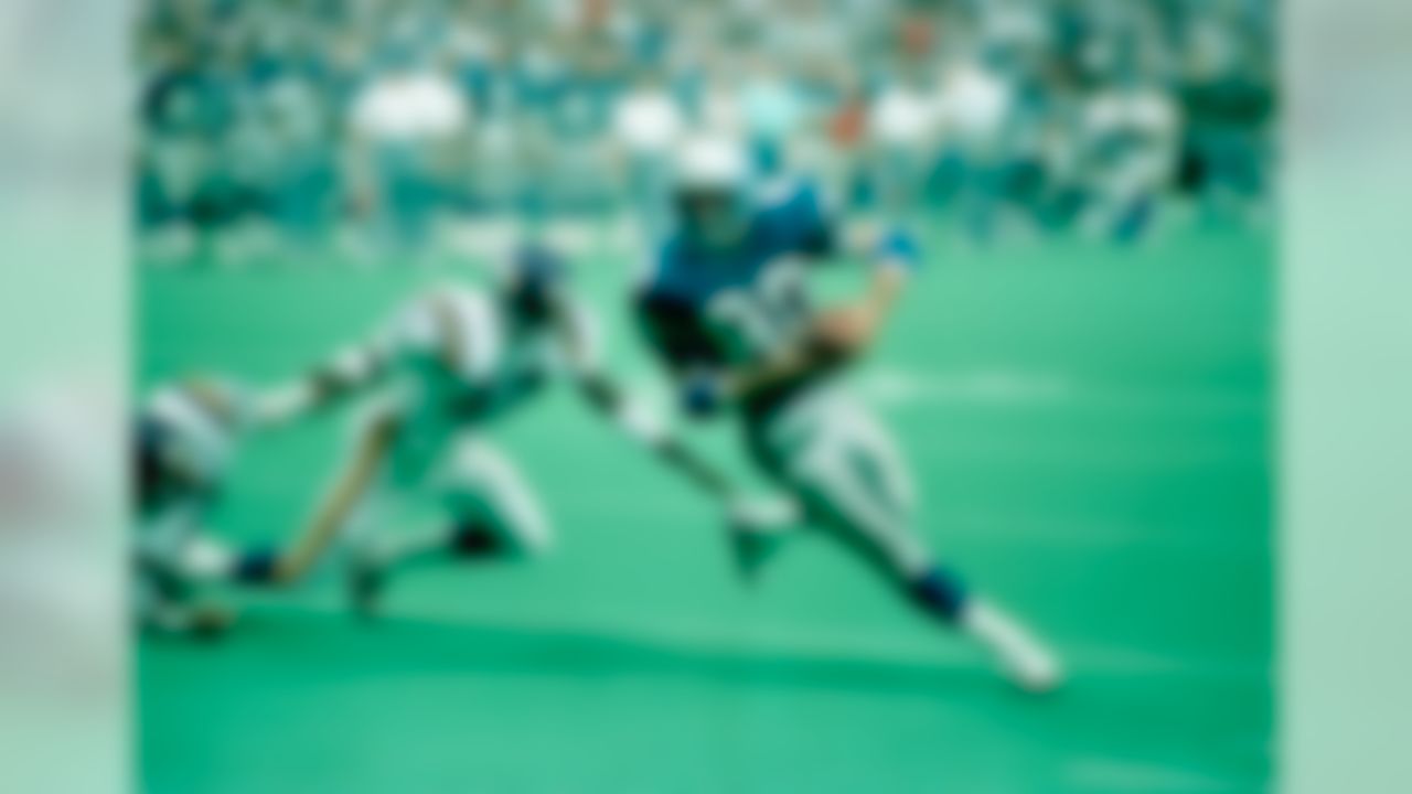 Steve Largent of the Seattle Seahawks heads into the end zone for a touchdown during second quarter action against the Minnesota Vikings on Aug. 23, 1986. David Evans (40) is seen in the background. (AP Photo/Gary Stewart)