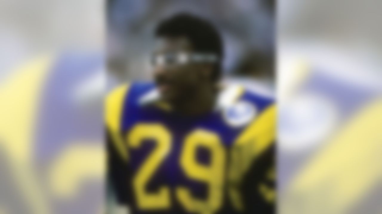 Hall of Fame running back Eric Dickerson (29) of the Los Angeles Rams during the Rams 20-0 victory over the Dallas Cowboys in the 1985 NFC Divisional Playoff Game on January 4, 1986 at Anaheim Stadium in Anaheim, California. Dickerson carried the football 34 times for an NFL Postseason record 248 yards and scored two touchdowns during the game. (National Football League)