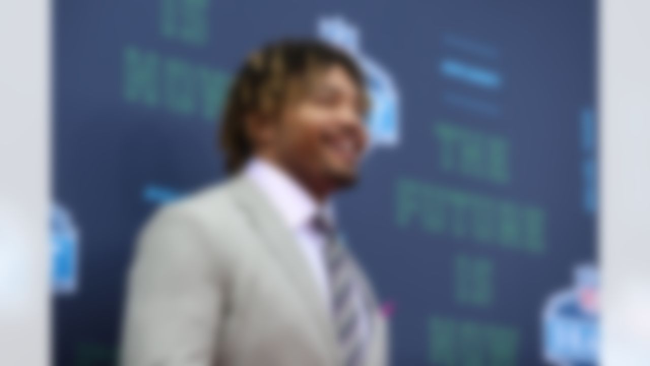 LSU running back Derrius Guice poses for photos.