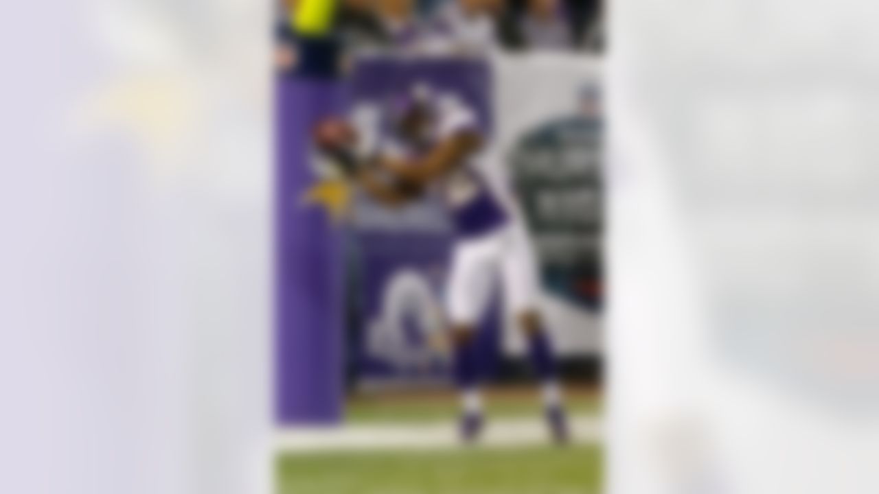 Minnesota Vikings wide receiver Percy Harvin (12) catches the football during a week 8 NFL football game against the Tampa Bay Buccaneers on Thursday, October 25, 2012 in Minneapolis, Minnesota. The Buccaneers defeated the Vikings 36-17. (AP Photo/Scott Boehm)