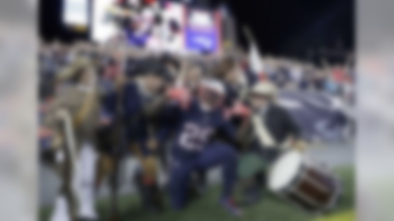 New England Patriots running back LeGarrette Blount (29) celebrates his touchdown with the End Zone Militia during the second half of an NFL football game against the Houston Texans Thursday, Sept. 22, 2016, in Foxborough, Mass. (AP Photo/Charles Krupa)