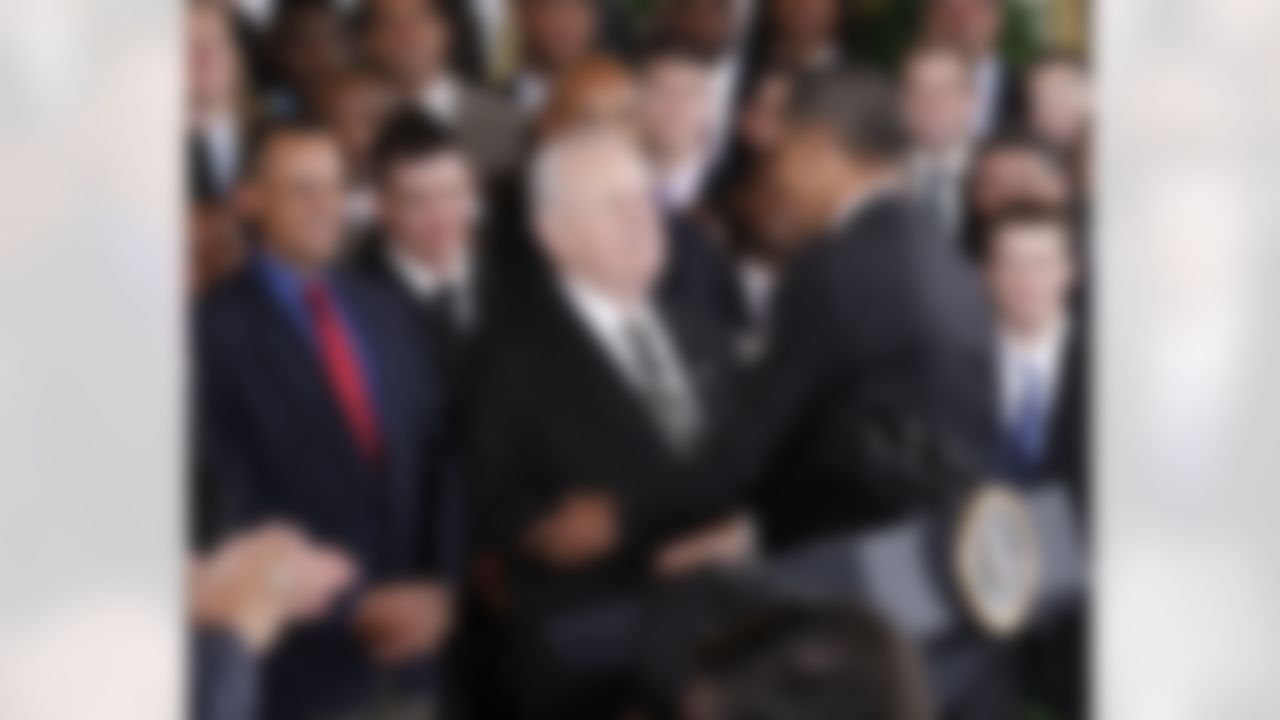 President Barack Obama, left, greets New Orleans Saints football team owner Tom Benson, center, during a ceremony in the East Room of the White House in Washington, Monday, Aug., 9, 2010, where he honored the 2009 NFL Super Bowl NFL Football Champions. (AP Photo/Pablo Martinez Monsivais)
