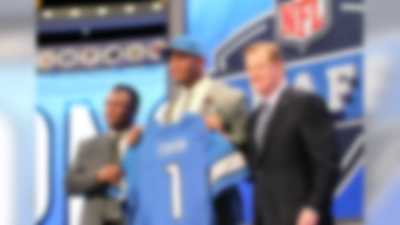 Eric Ebron poses for a picture with Hall of Fame running back Barry Sanders and NFL Commissioner Roger Goodell after bering selected by the Detroit Lions during the 2014 NFL Draft at Radio City Music Hall on May 8, 2014 in New York, NY. (Perry Knotts/NFL)