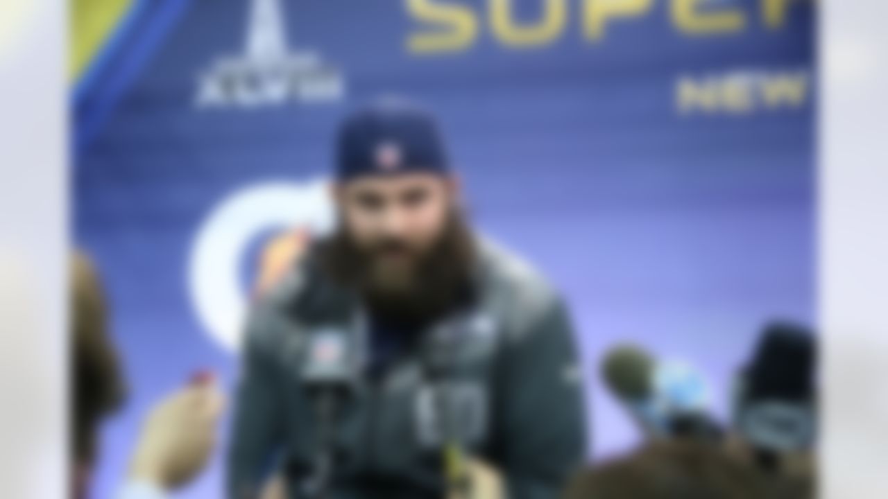 Seattle Seahawks center Max Unger (60) answers questions from the media during the Super Bowl XLVIII Media Day at the Prudential Center on Tuesday, January 28, 2014 in Newark, NJ. (Ben Liebenberg/NFL)
