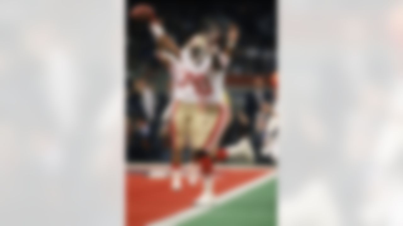 San Francisco 49ers wide receiver Jerry Rice catches a 20-yard touchdown pass in the first quarter of Super Bowl XXIV against the Denver Broncos on January 28, 1990. Rice had three touchdown receptions in the 49ers' 55 - 10 victory. (AP Photo/Al Messerschmidt)