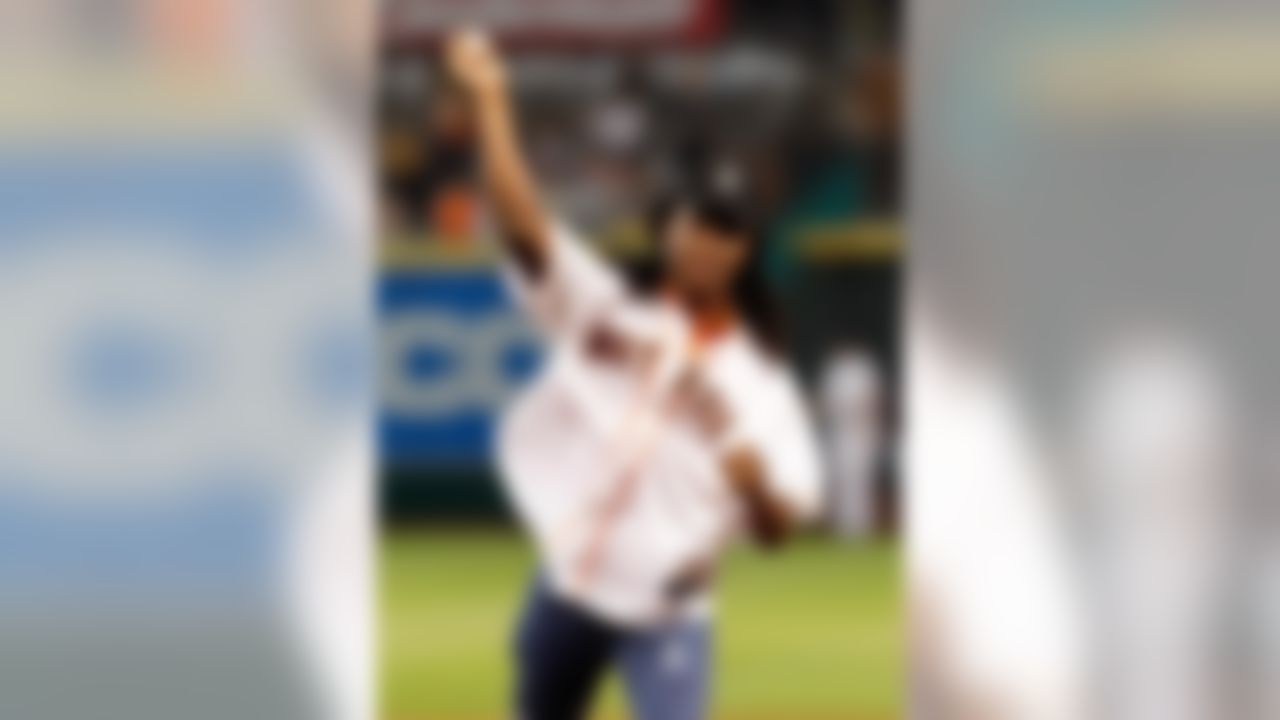 Houston Texans first-round pick DeAndre Hopkins throws out the first pitch before a baseball game between the Kansas City Royals and the Houston Astros, Tuesday, May 21, 2013, in Houston. (AP Photo/Bob Levey)