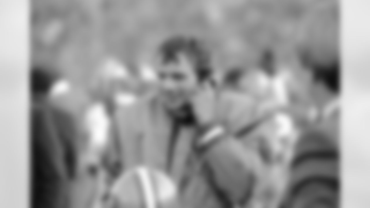 San Francisco 49ers' quarterback Joe Montana (16) wears a happy smile as he talks on the sideline phone during a break in Super Bowl XIX at Stanford Stadium in Stanford, CA on January 20, 1985. (Associated Press)