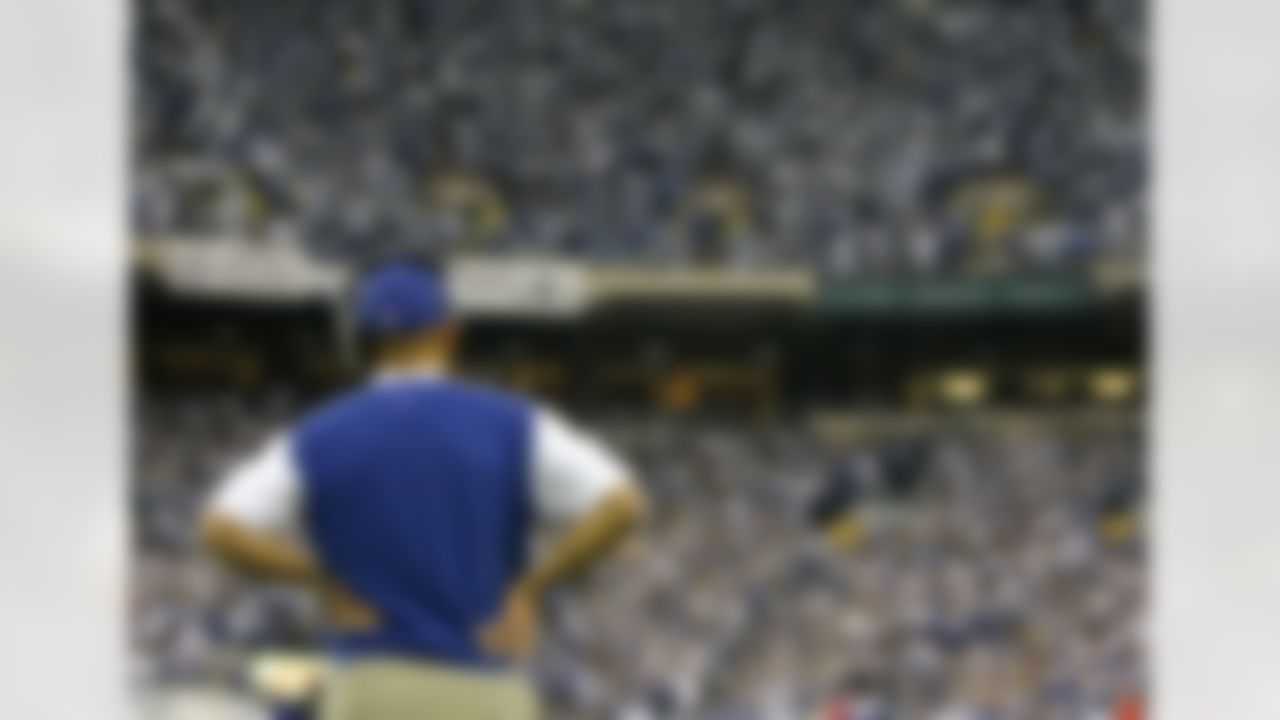 Indianapolis Colts coach Tony Dungy watches from the sidelines during the Colts' 28-24 loss to the San Diego Chargers in an NFL divisional playoff football game Sunday, Jan. 13, 2008, in Indianapolis. (AP Photo/Jeff Roberson)