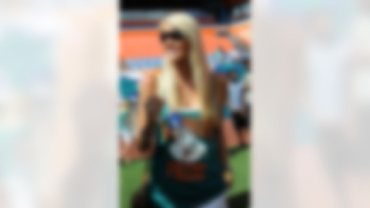 Aug. 4, 2012; Miami, FL, USA; Lauren Ufer the wife of Miami Dolphins quarterback Ryan Tannehill (not pictured) is seen on the sidelines after a scrimmage at Sun Life Stadium. Mandatory Credit: Steve Mitchell-US PRESSWIRE