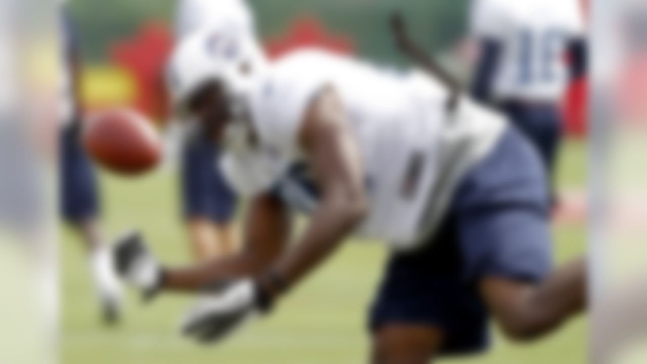 Tennessee Titans tight end Jared Cook (89) loses control of the ball during NFL football training camp at the team's headquarters, Monday, July 30, 2012, in Nashville, Tenn. (AP Photo/Wade Payne)