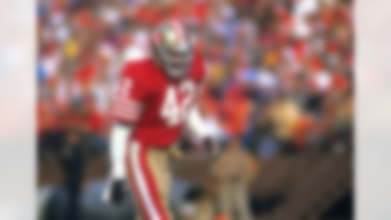 San Francisco 49ers defensive back Ronnie Lott (42) waits for the snap during an NFL game against the Atlanta Falcons on Sunday, Dec. 20, 1987, in San Francisco. The 49ers won the game, 35-7. (AP Photo/Greg Trott)