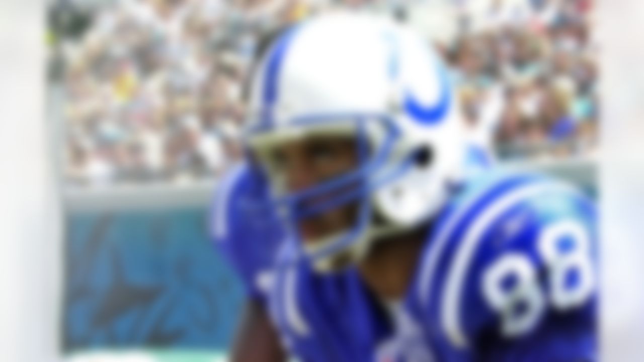 Wide receiver Marvin Harrison (88) of the Indianapolis Colts watches play against the Jacksonville Jaguars in August 2002 in Jacksonville, Florida. (AP Photo/Al Messerschmidt)