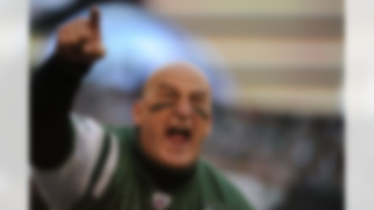 Fireman Ed in the stands yelling, week eleven, during the NFL football game between the Houston Texans against the New York Jets on Sunday, November 21, 2010 at New Meadowlands Stadium in East Rutherford, New Jersey. The Jets beat the Texans 30-27. (AP Photo/David Drapkin)