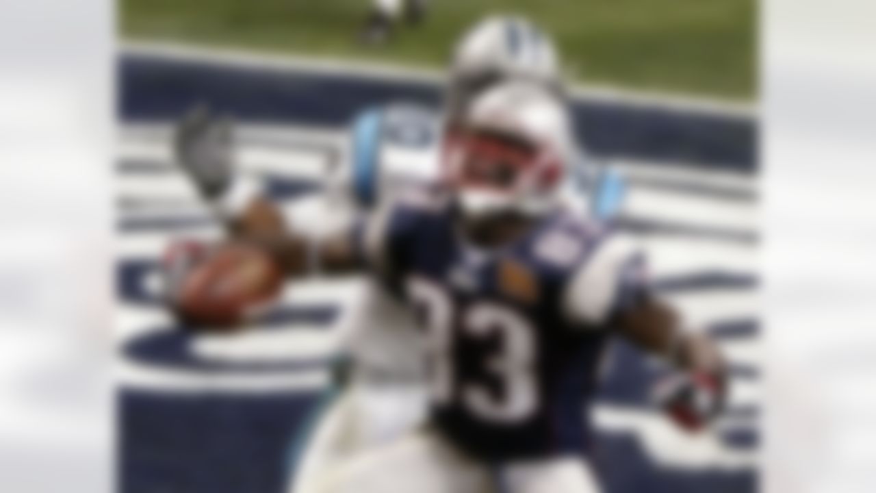New England Patriots Deion Branch (83) reacts after scoring the Patriots first touchdown against the Carolina Panthers in the second quarter of Super Bowl XXXVIII at the Reliant Stadium in Houston, TX Sunday Feb. 1, 2004. (AP Photo/Morry Gash)