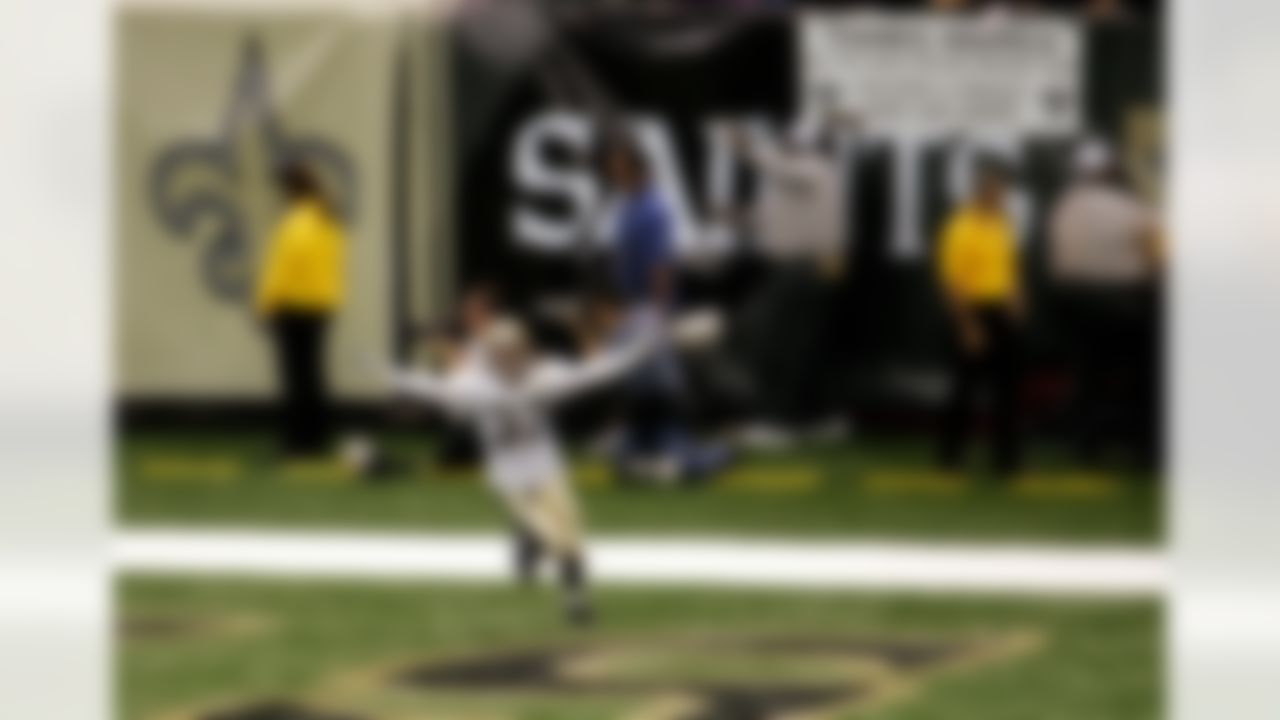 New Orleans Saints' Steve Gleason (37) sprints through the end zone after blocking an Atlanta Falcons punt in the first quarter of their NFL football game at the newly re-opened Louisiana Superdome in New Orleans on Monday, Sept. 25, 2006. The Saints recovered for a touchdown. (AP Photo/Alex Brandon)