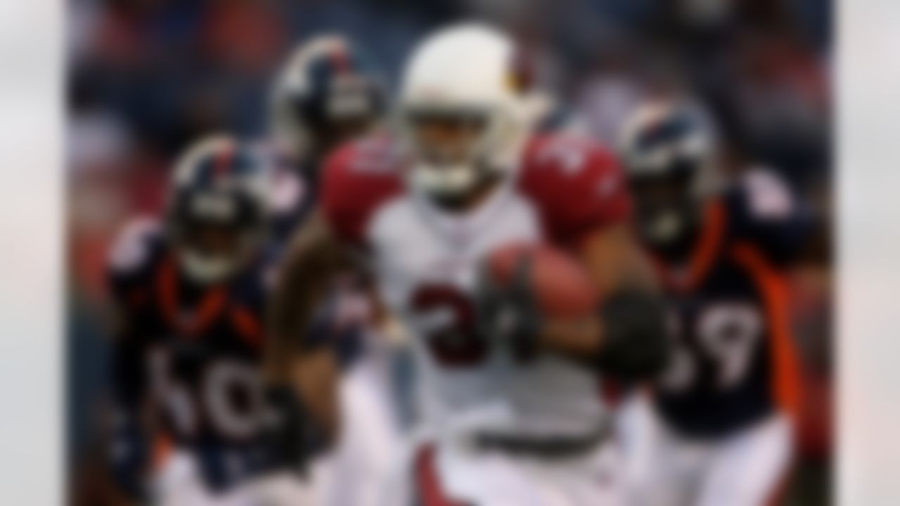 DENVER - AUGUST 30: Marcel Shipp #31 of the Arizona Cardinals rushes for a first down against the Denver Broncos during NFL preseason action at Invesco Field August 30, 2007 in Denver, Colorado. (Photo by Doug Pensinger/Getty Images)