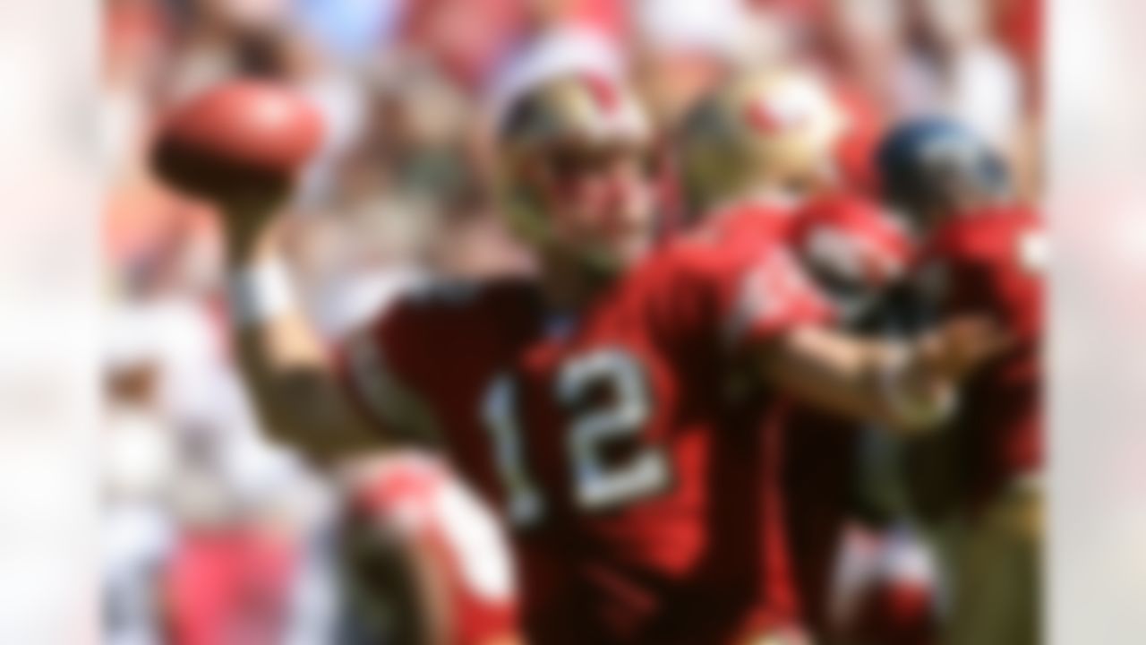 SAN FRANCISCO - SEPTEMBER 30: Quarterback Trent Dilfer #12 of the San Francisco 49ers tosses a pass during a game against the Seattle Seahawks at Monster Park September 30, 2007 in San Francisco, California. (Photo by Greg Trott/Getty Images)